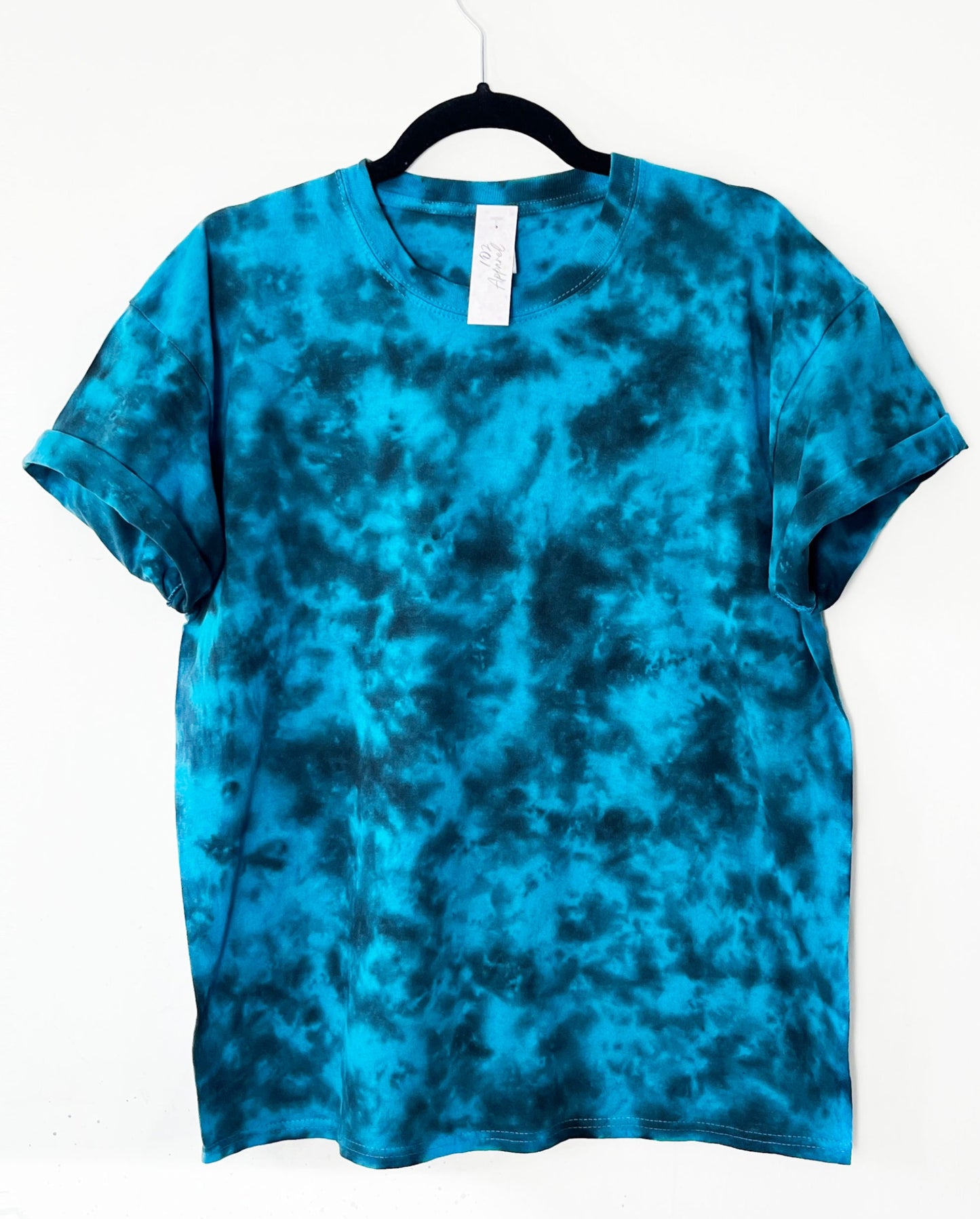 light blue crewneck t shirt with black pattern