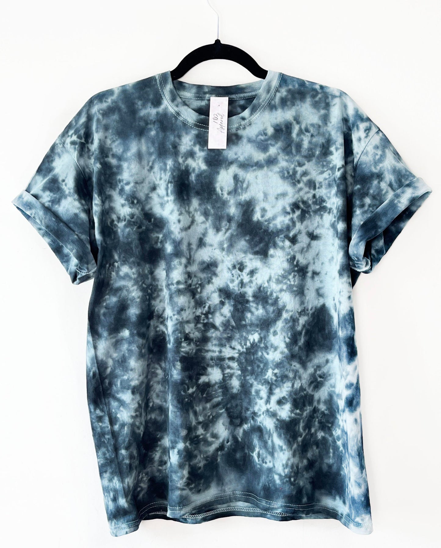 light blue crewneck t shirt with black pattern