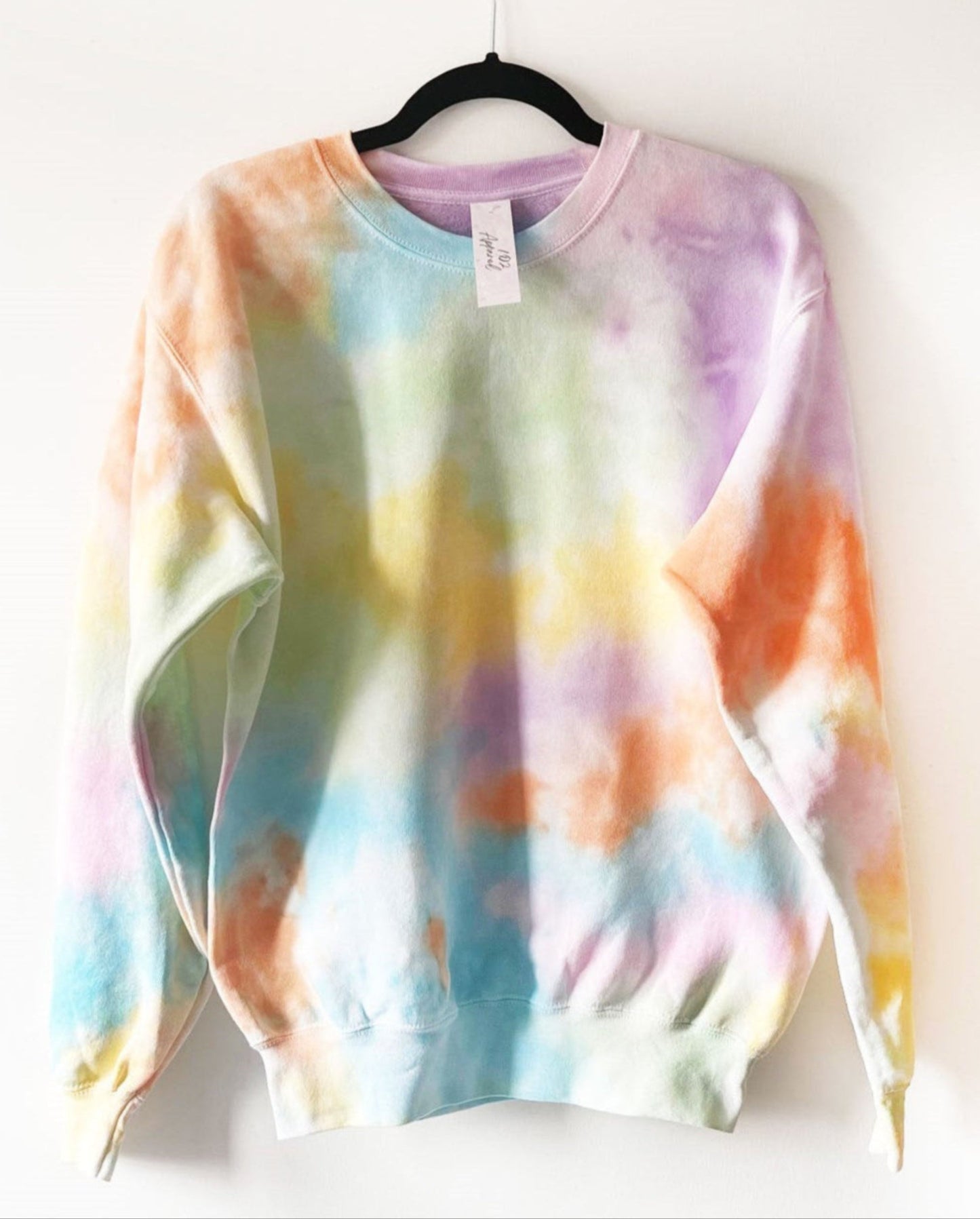long sleeve crewneck sweatshirt with pastel rainbow colours