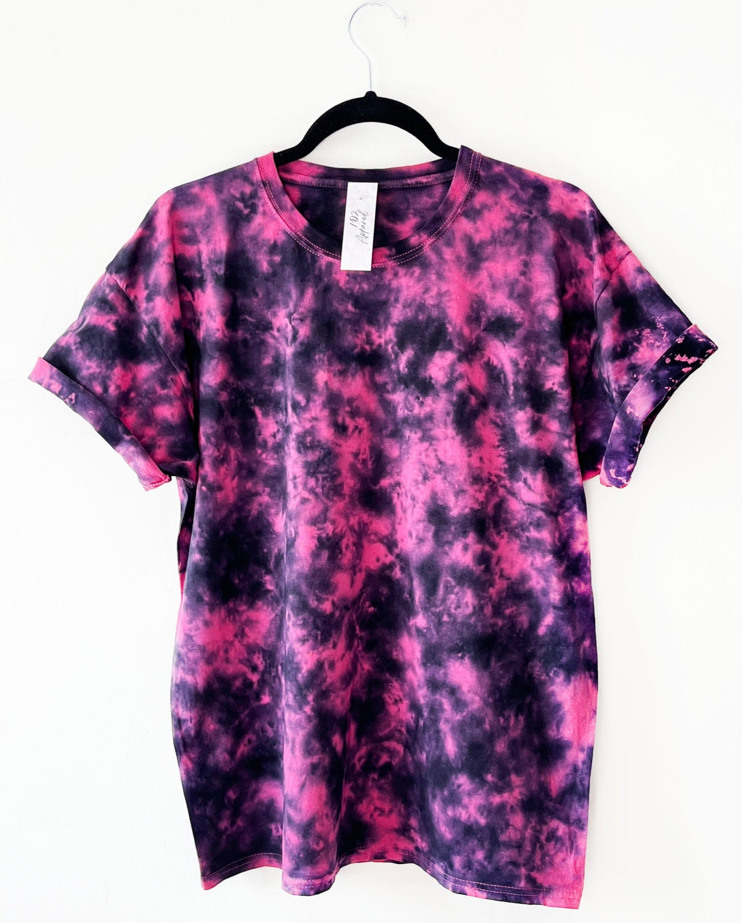 pink crewneck t shirt with black pattern