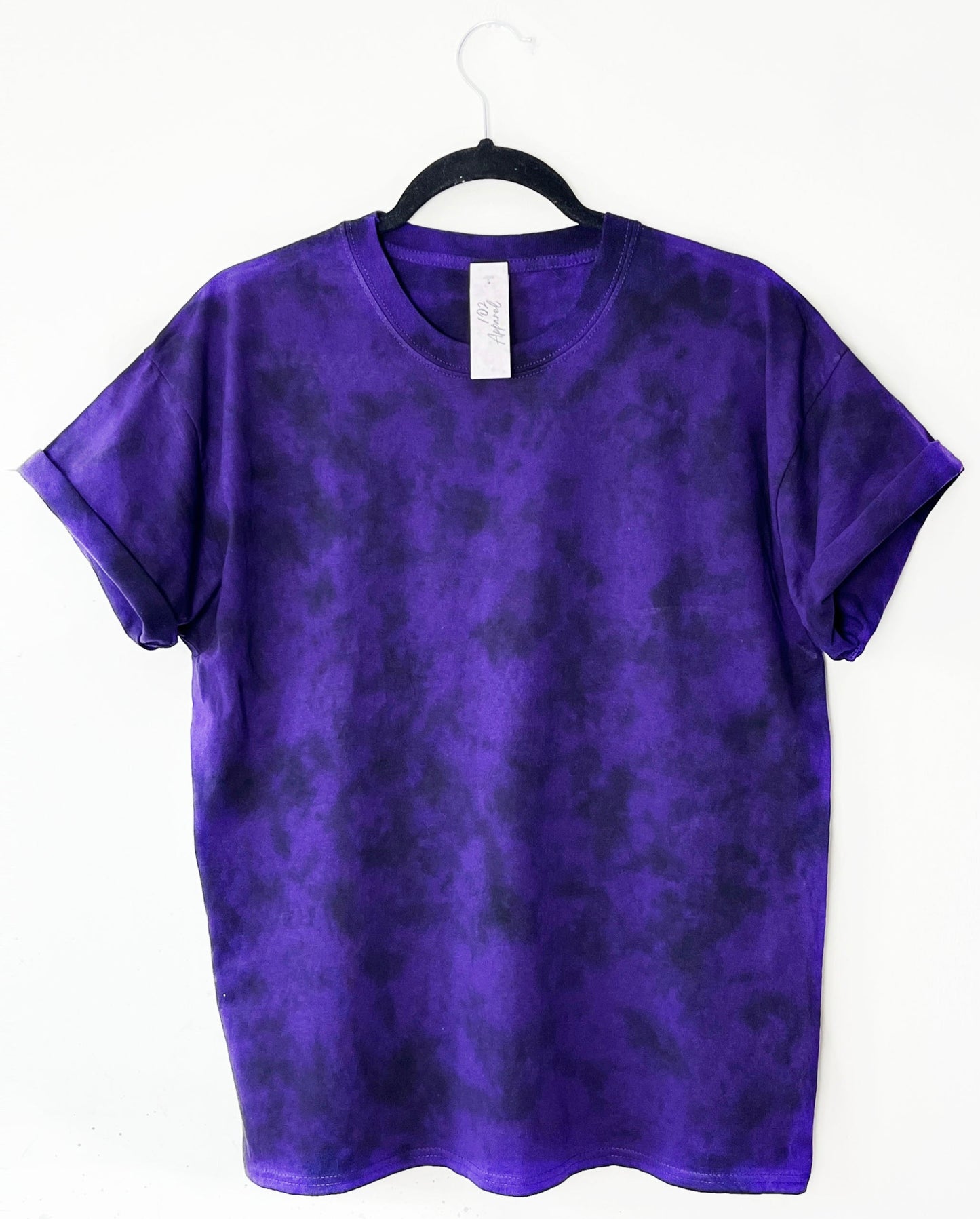 purple crewneck t shirt with black pattern