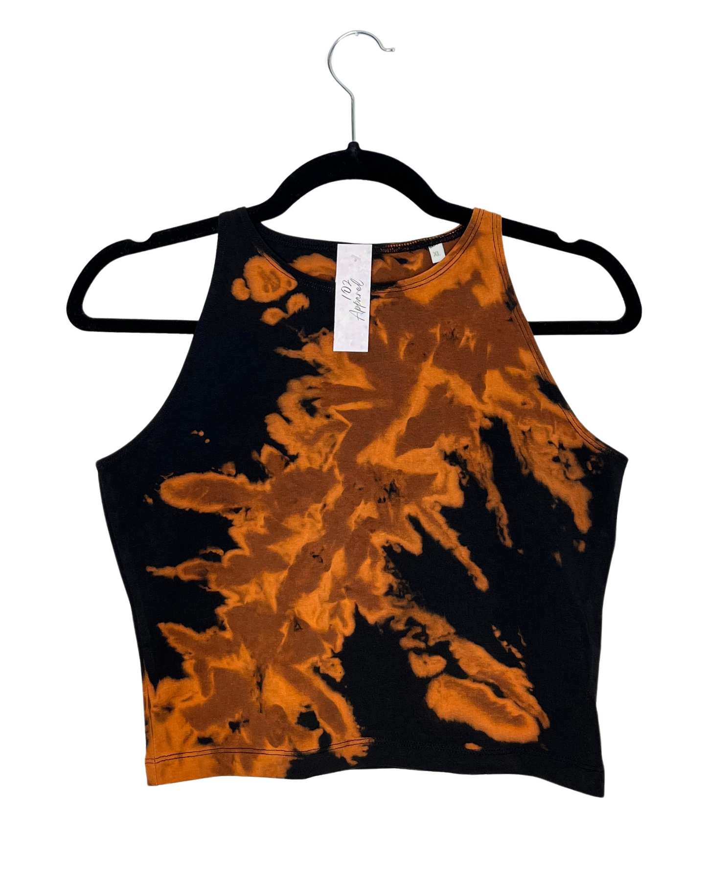 a black racerback crop top with diagonal orange bleach design 
