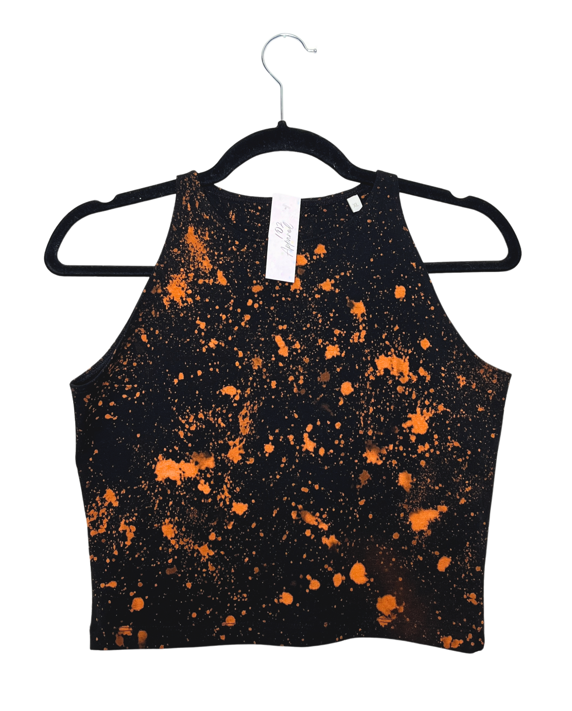 A black racerback crop top with paint splatter effect bleach orange pattern