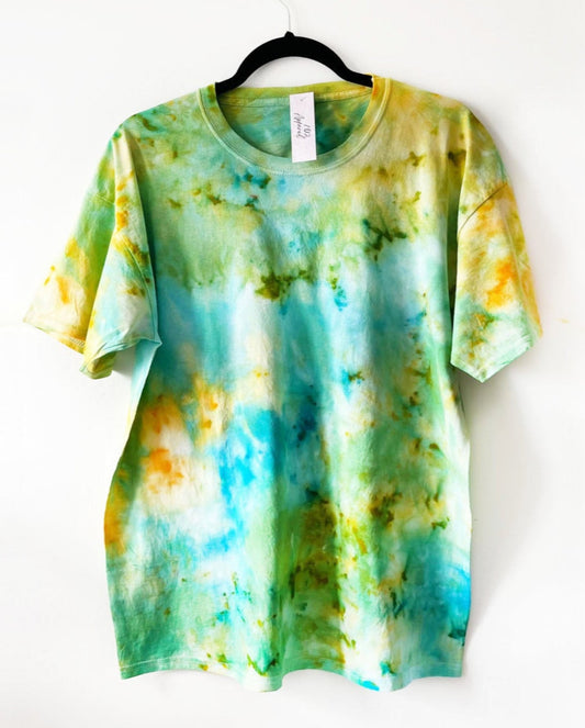 a crewneck short sleeve t shirt with yellow, blue and green pattern
