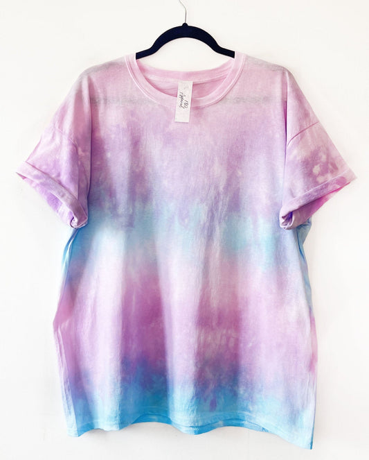 a crewneck t shirt with blended pastel blues pinks and purple colours to 