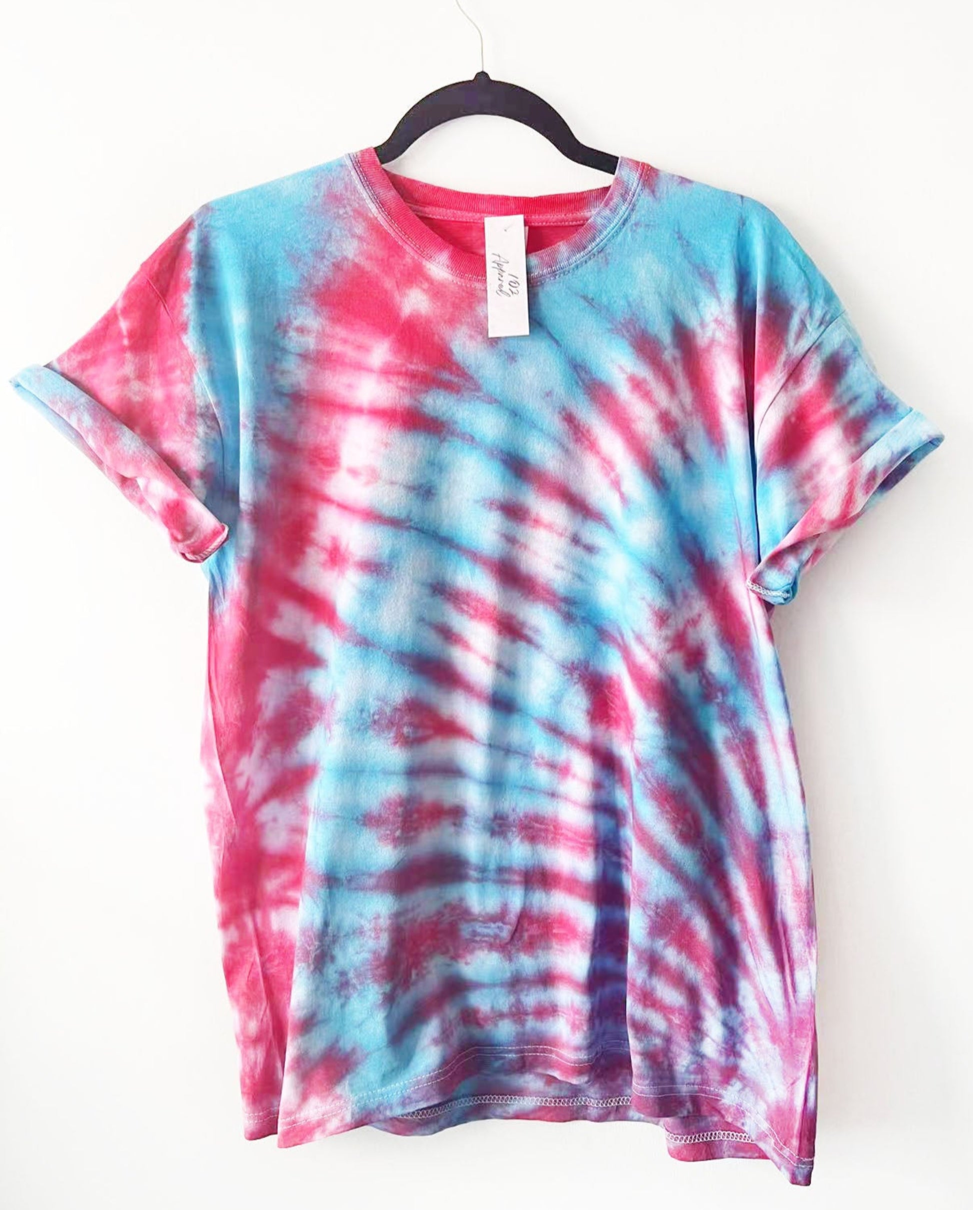 a crewneck t shirt with blue and red web like design